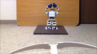 i-SOBOT catches an arrow.