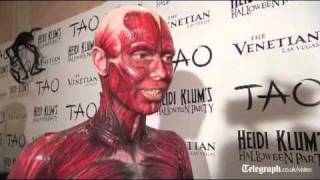 Heidi Klum strips off skin for Halloween