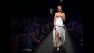 Model Keeps Tripping And Faces Wardrobe Malfunction During Ifema Feria De Madrid