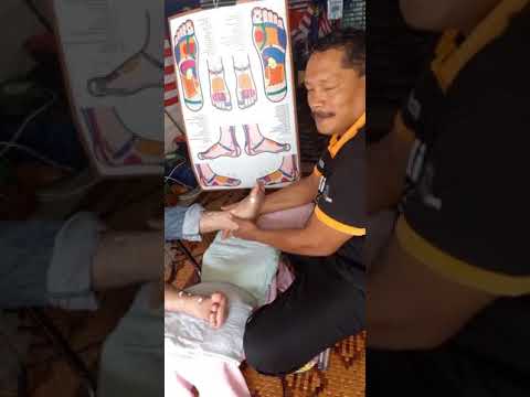 Video: Pengurut kaki dan buku lali