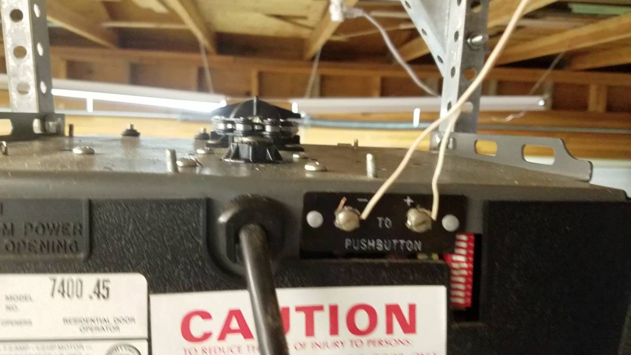 How to Tighten the Chain on a Stanley 7400 Garage Door Opener 