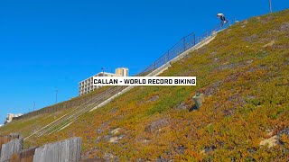 Callan Stibbards doing BMX stunts on a 70 plus stair rail