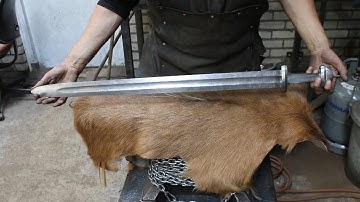 Forging a wild Damascus viking sword, part 3, making the guard and the pommel.