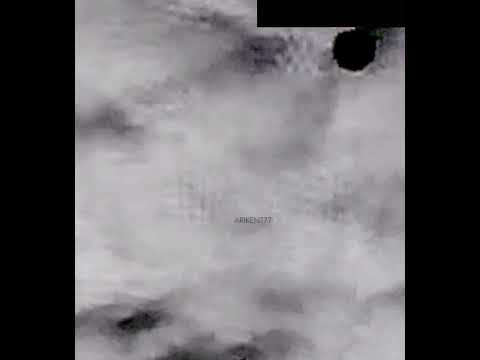 UFO flying In and Out of Clouds