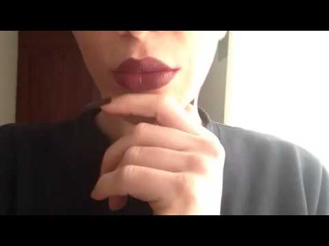 laire touching her face with black long nails (video 7)