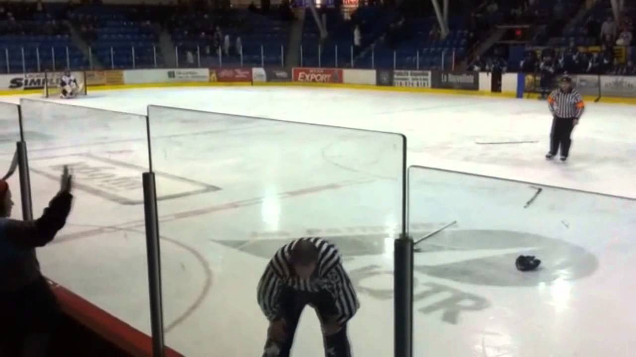 Brett Cook gets a lifetime ban for punching a linesman . Feb 2013