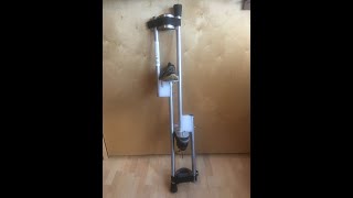 Carrying 'Stilt Factory' stilts.