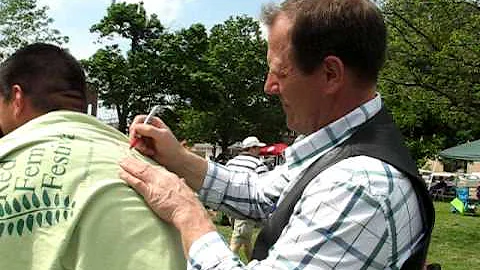 Stewart Peterson signs an autograph