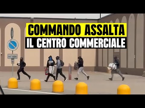 Video TERRORE NEL CENTRO COMMERCIALE ITALIANO: COMMANDO ASSALTA GIOIELLERIA CON MAZZE E PICCONI - LODI