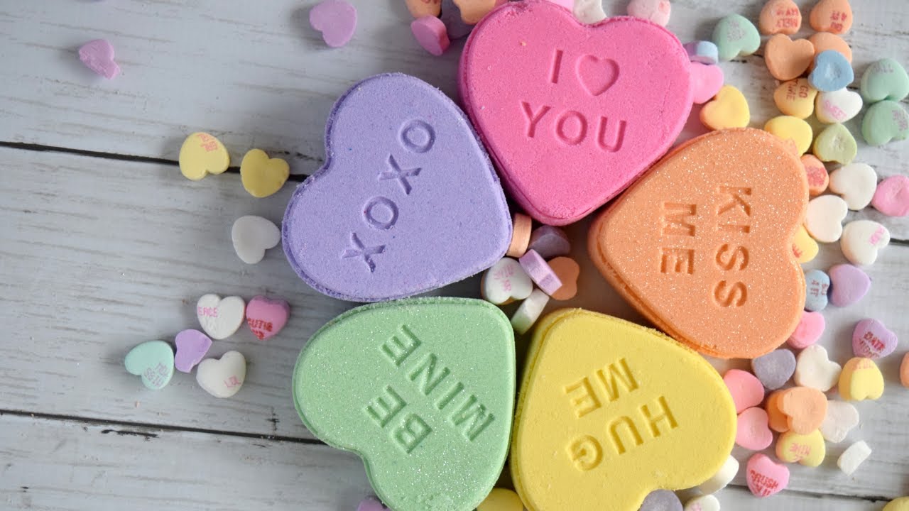 Shrink Wrapping Conversation Heart Bath Bombs for Valentine's day