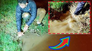 Removal!!! Trash And Plastic Clogged Culvert Drain On Street Road The Night After Heavy Rain