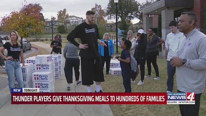 Thunder players help distribute Thanksgiving meals to families