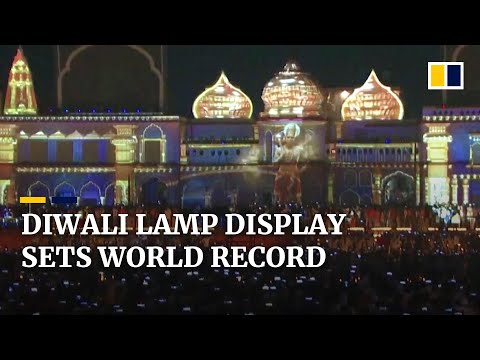 Indian city of ayodhya breaks own guinness record with nearly 1. 5 million oil lamps lit for diwali