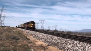 Yellow & Blue Former Santa Fe GP60 BNSF #8738 leads a local at Antares, Arizona Yellow & Blue Former Santa Fe GP60 BNSF #8738 leads a local at Antares, Arizona