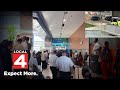 Travelers describe panic after car crashes into Detroit Metro Airport terminal
