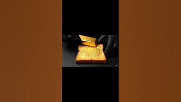 Spreading a gold bar on toast...  #asmr #oddlysatisfying #satisfying #gold  #asmrtriggers #relaxing