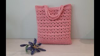 :     .  . Charming knitted bag.