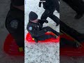 Whoops, watch out! Officers joined a group of kids for sled riding, accidentally crashing into one.