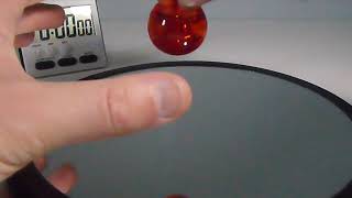 DRAFT Slow Motion 240 FPS Red Plastic Tippy Top Rolling Away. Need to Launch Forward.