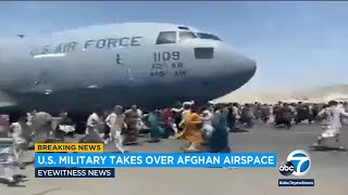 Video shows Afghans clinging to US military plane as it takes off from Kabul airport | ABC7