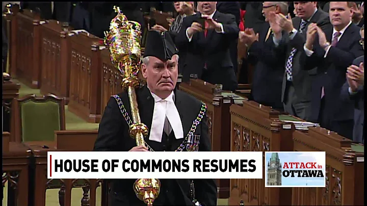 Sergeant-at-Arms Kevin Vickers receives standing o...