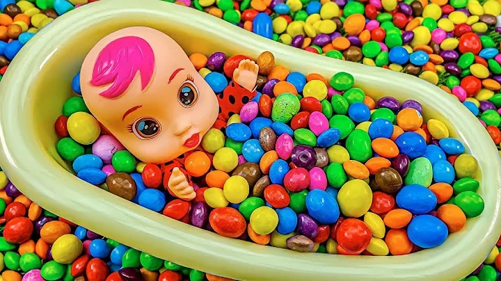 Watch the video about ASMR Satisfying Video - Color BathTub Mixing Rainbow Candy - Color Cat Cutting | Satisfying Rainbow