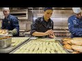 Inside the Kitchen of a US Navy Ship During Rush Time