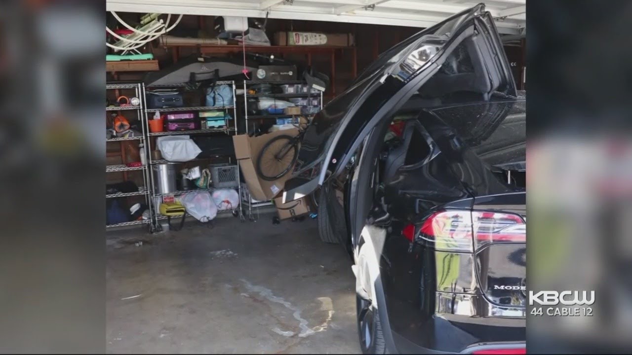 Family Sues Tesla After Model X Pinned Pregnant Mother In Garage, Broke Her Bones - YouTube