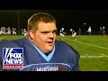 Waterboy with down syndrome scores touc.own