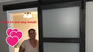 Our first barn door reveal and DIY install- ReliaBilt 3-Panel MDF Kit from Lowe's
