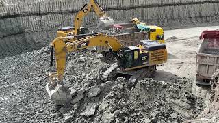 Caterpillar 352F Excavators Loading Trucks
