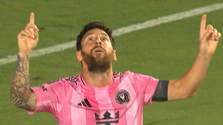 Lionel Messi takes away ball from goalkeeper and scores his second goal of game