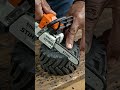 Tiny STIHL Chainsaw Cuts real tire