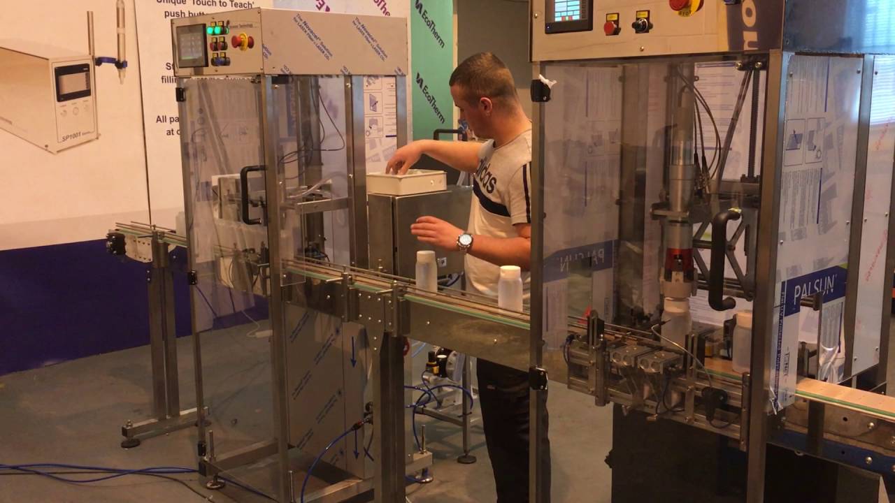 Semi automatic filling and capping line