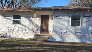 They finally finish Installing the Tyvek house wrap!! 
