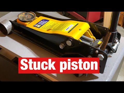 Floor Jack With A Stuck Piston Repaired