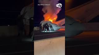 Frantic rush to pull survivors from burning plane crash