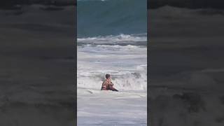 Lifeguard rescues child from a monster surf