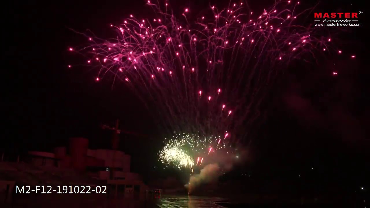 Pyrotechnics 0.8" 208 shot Z Green Strobe Mine / Purple Crossette Cake Fireworks