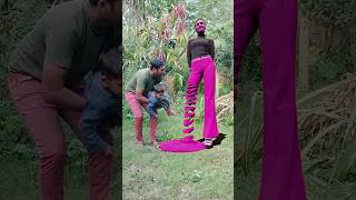 Pink Girl Sand Sculpture Falling Down