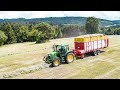 Chantier de ramassage de foin du champs  la grange 