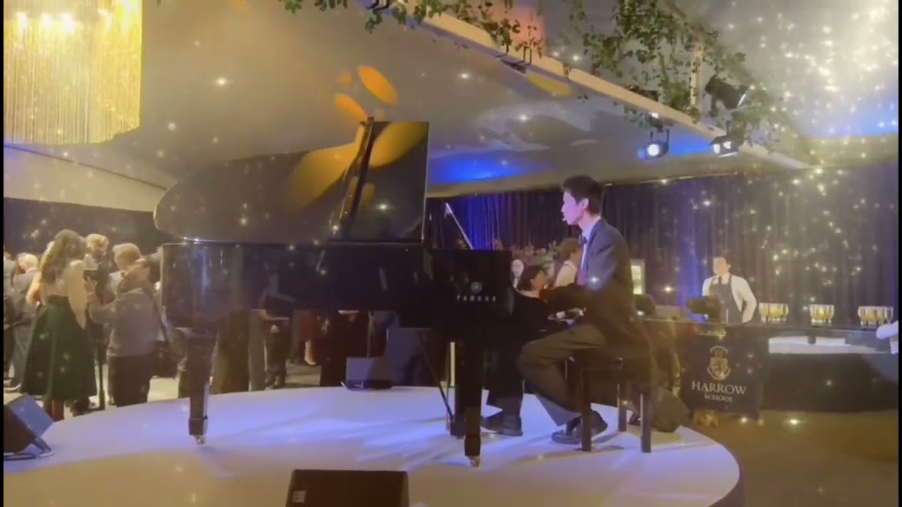 “Fly Me to the Moon” at the Harrow Gala Dinner, which raised funds for  School’s Sports Centre.