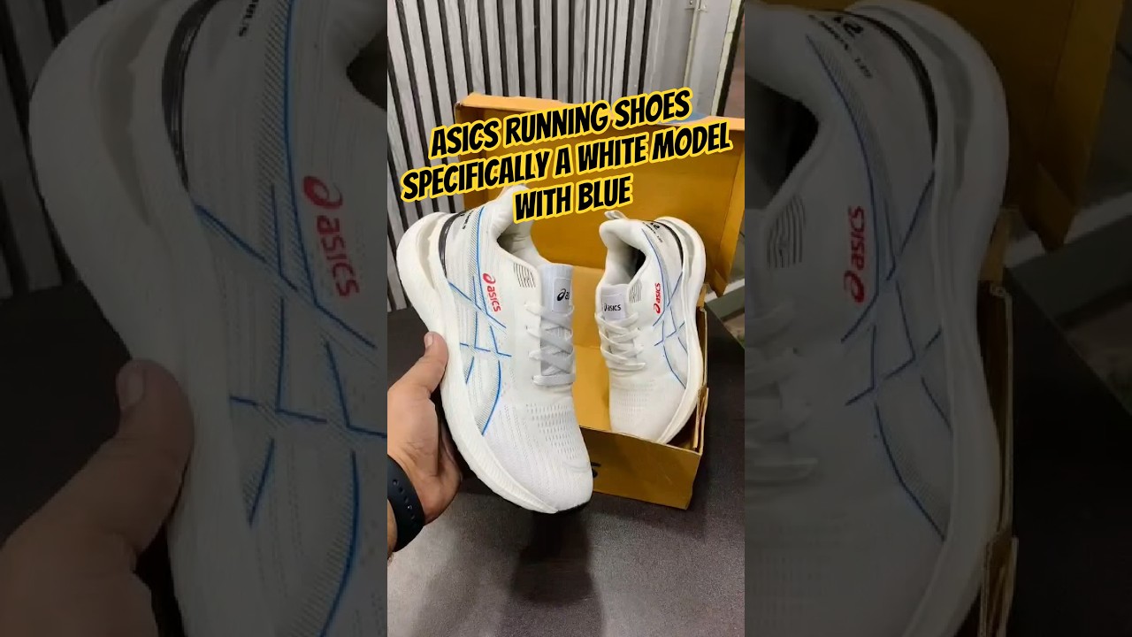 Asics running shoes specifically a white model with blue 💙👟❣️ 