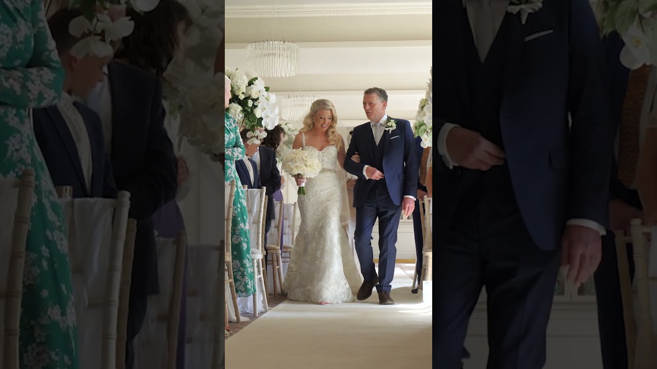 Bride Walking Down The Aisle With Her Father
