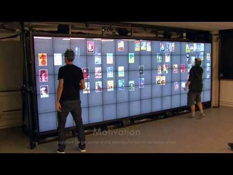 CoReach: Cooperative Gestures for Data Manipulation on Wall-sized Displays