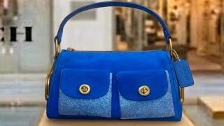 Coach Turnlock Haversack shoulder bag in blue suede.