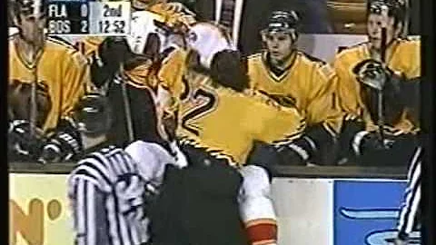 Bonvie deposites Worrell into Bruins' bench