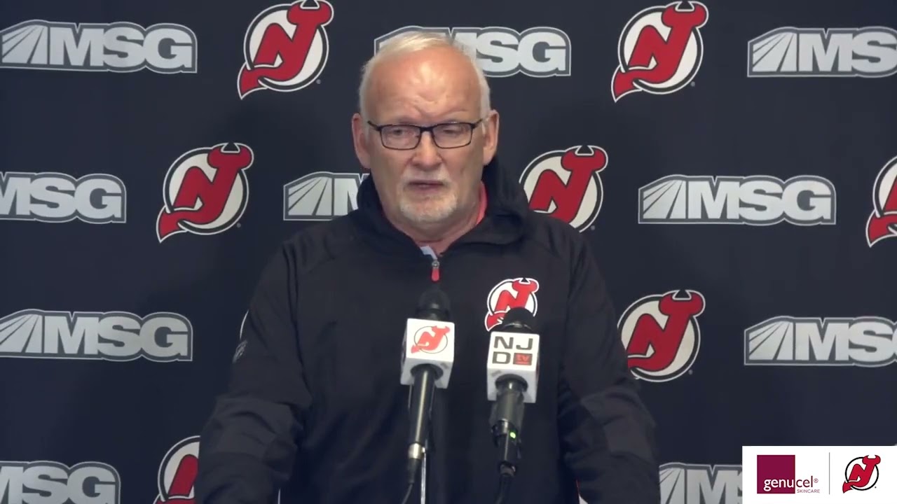 Lindy Ruff shows support by wearing Bills mask at Devils practice