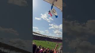Man Paraglides Into Stadium and Gets Stuck in the Canopy