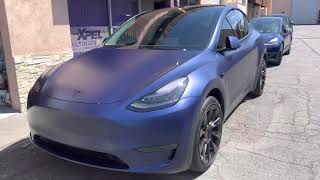 Tesla Model Y long range deep blue with Stealth PPF and ceramic tint. Smoked headlights.